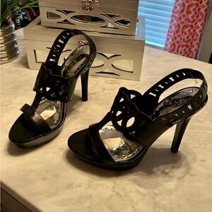 Bcbg girls black leather heels with patent leather.   Used.